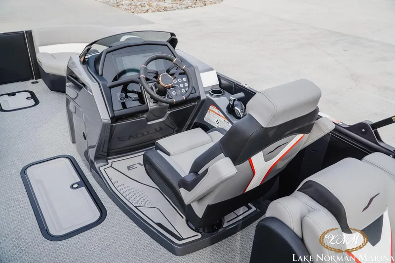 Slide: The Image of 2026 Evotti 723QL boat interior with modern steering console and comfortable seating. - 10