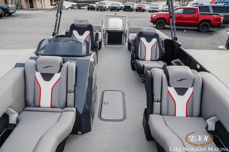 Slide: The Image of Luxurious 2026 Evotti 723QL boat interior with modern seating at Lake Norman Marina. - 16