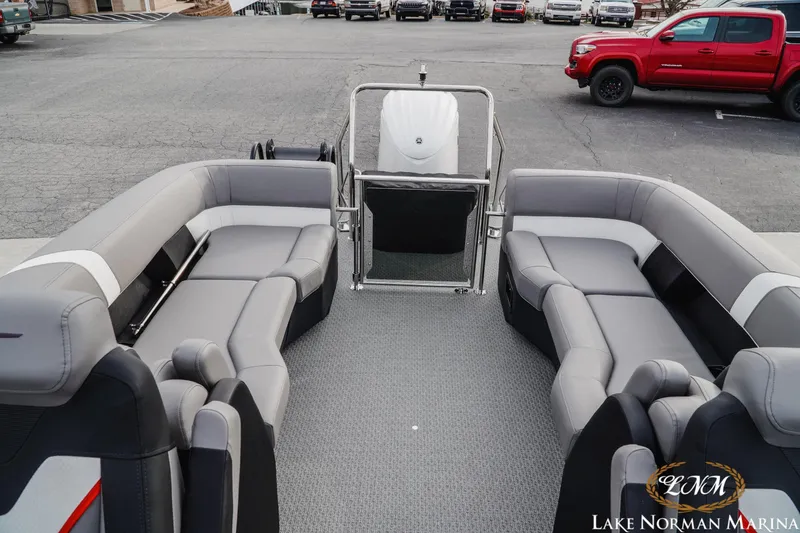 Slide: The Image of Interior of 2026 Evotti 723QL boat with gray seating at Lake Norman Marina. - 20