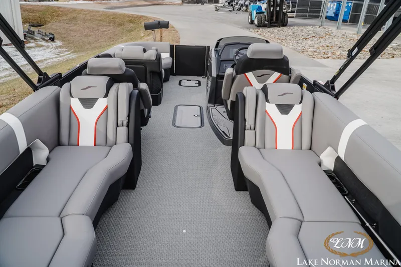 Slide: The Image of 2026 Evotti 723QL boat interior with modern seating at Lake Norman Marina. - 6