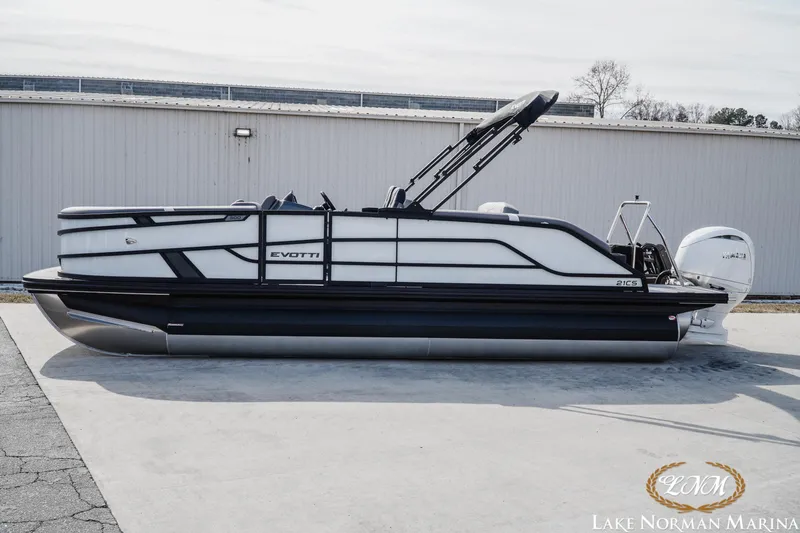 The Image of 2026 Evotti 521CS pontoon boat with sleek design at Lake Norman Marina. - 1