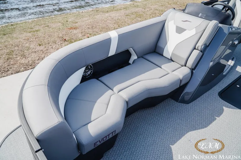 Slide: The Image of Luxurious seating on 2026 Evotti 521CS boat at Lake Norman Marina. - 13