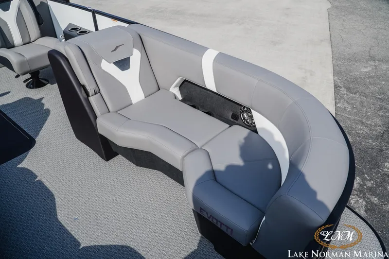 Slide: The Image of Luxurious seating on 2026 Evotti 521CS boat, featuring sleek gray upholstery. - 14