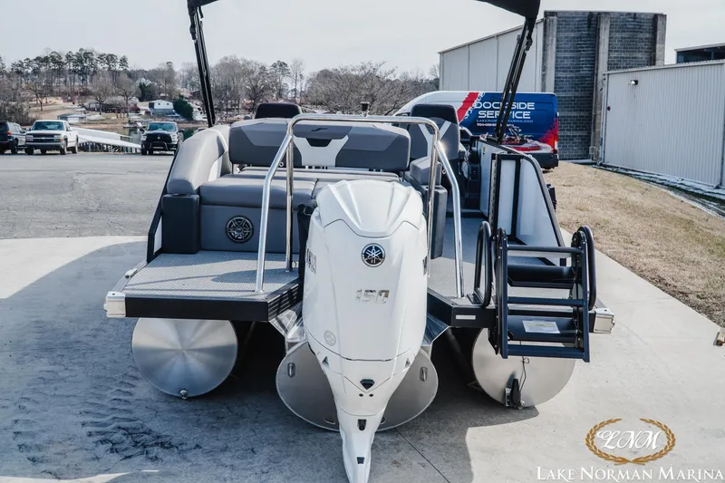 Slide: The Image of 2026 Evotti 521CS pontoon boat with Yamaha engine at Lake Norman Marina. - 4