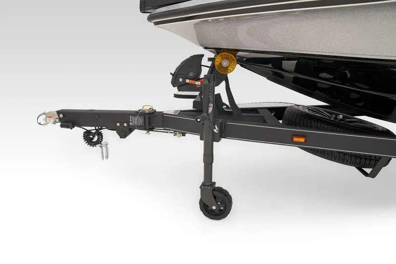 Slide: The Image of 2026 Triton 21XP Patriot boat storage compartment with secure latch and organized interior layout. - 16