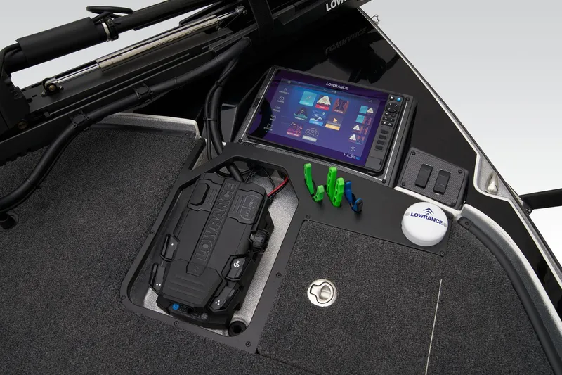 Slide: The Image of Open storage compartment in 2026 Triton 21XP Patriot boat interior. - 24