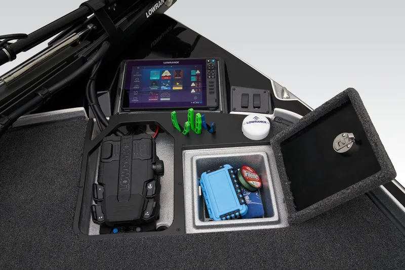 Slide: The Image of Open storage compartment in 2026 Triton 21XP Patriot boat, featuring carpeted interior and sleek design. - 30