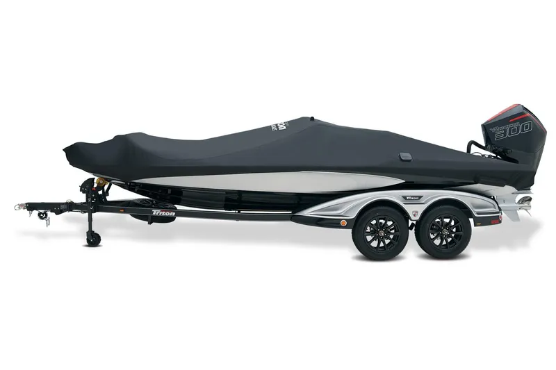 Slide: The Image of 2026 Triton 21XP Patriot boat in showroom, featuring sleek design and dual seats. - 5