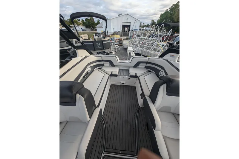 Slide: The Image of 2014 Yamaha Boats 242 Limited S interior with sleek seating and modern design. - 12