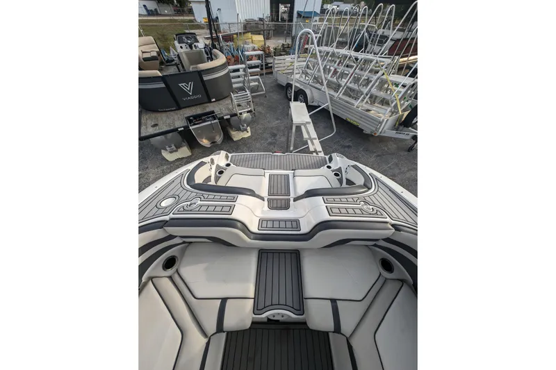 Slide: The Image of 2014 Yamaha Boats 242 Limited S interior with sleek seating and modern design. - 14