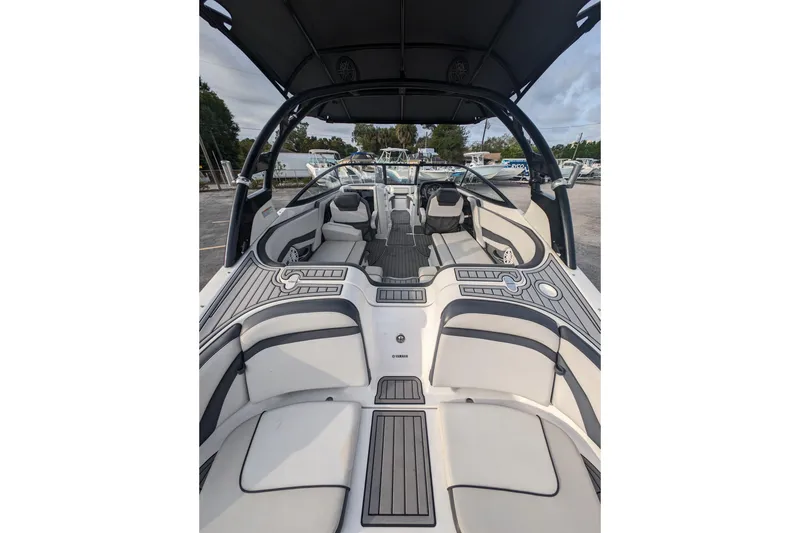 Slide: The Image of 2014 Yamaha Boats 242 Limited S interior with sleek seating and modern design. - 4