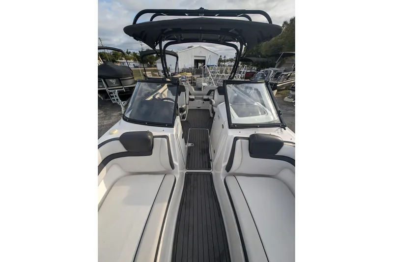 Slide: The Image of 2014 Yamaha Boats 242 Limited S interior with sleek seating and modern design. - 6