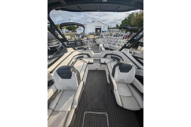 Slide: The Image of 2014 Yamaha Boats 242 Limited S interior with sleek seating and modern design. - 8