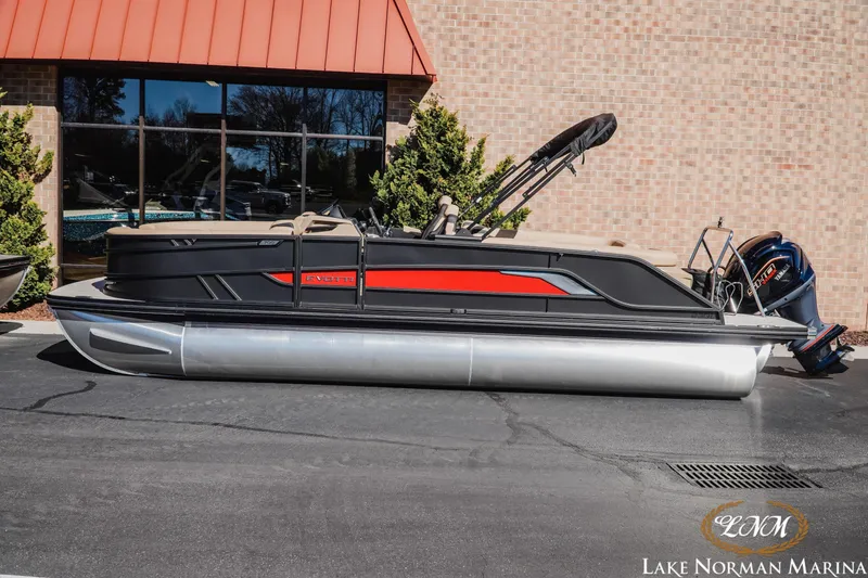 The Image of 2026 Evotti 723QL pontoon boat with sleek design at Lake Norman Marina. - 1