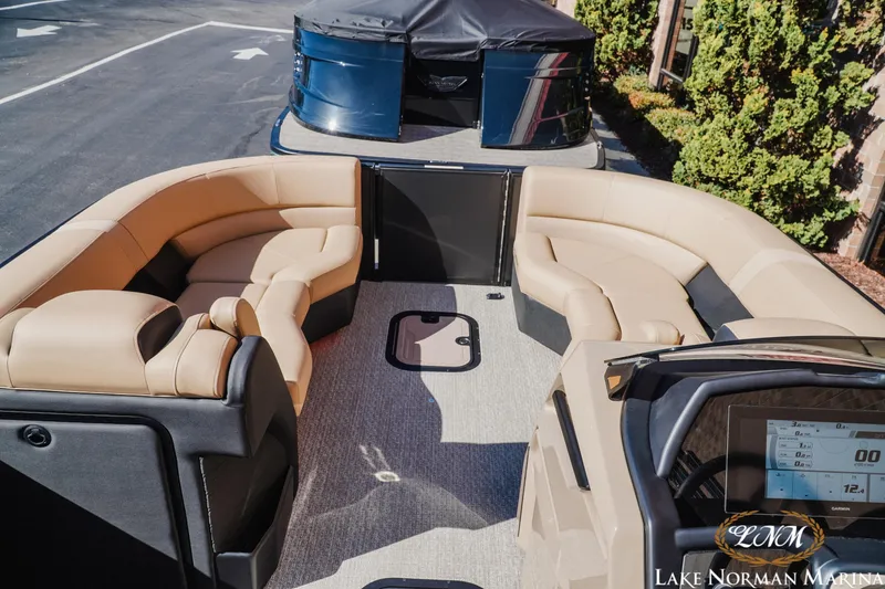 Slide: The Image of Luxurious 2026 Evotti 723QL pontoon boat with spacious seating and modern dashboard. - 15