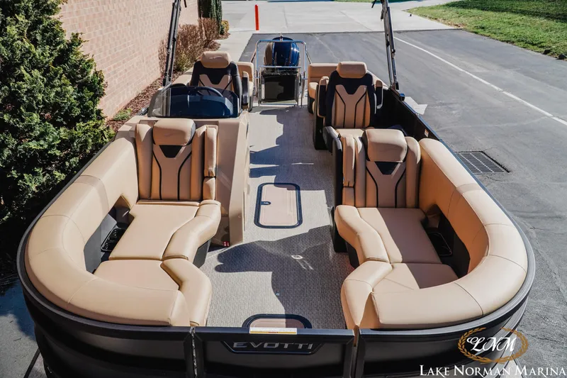 Slide: The Image of 2026 Evotti 723QL luxury pontoon boat with spacious seating at Lake Norman Marina. - 16