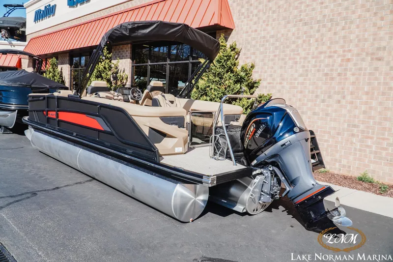 Slide: The Image of 2026 Evotti 723QL pontoon boat with Yamaha outboard motor at Lake Norman Marina. - 4