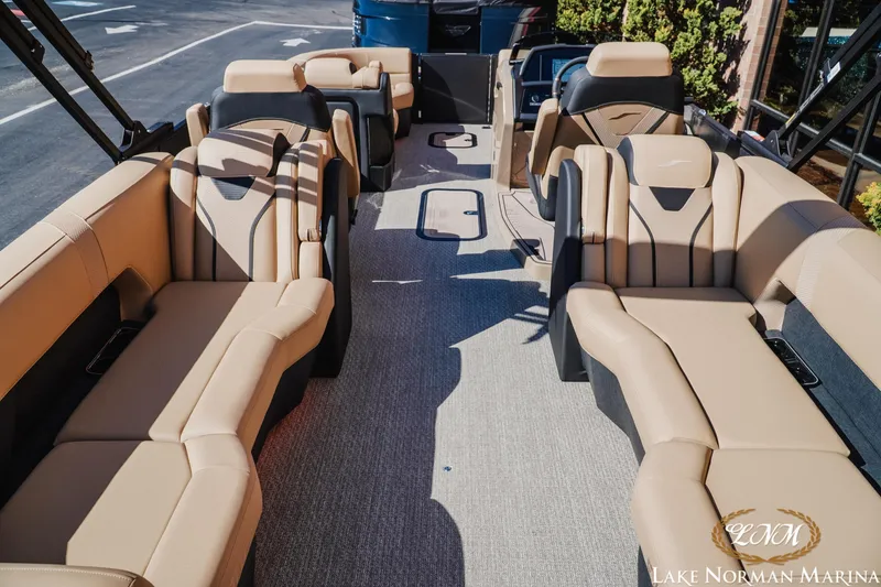 Slide: The Image of Luxurious interior of 2026 Evotti 723QL boat with beige seating at Lake Norman Marina. - 7
