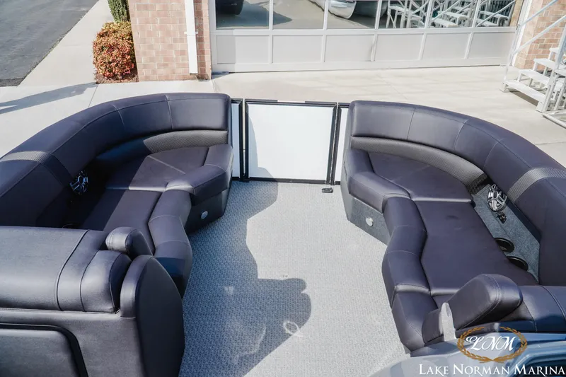 Slide: The Image of Luxurious seating area on 2026 Evotti 523CS boat at Lake Norman Marina. - 11