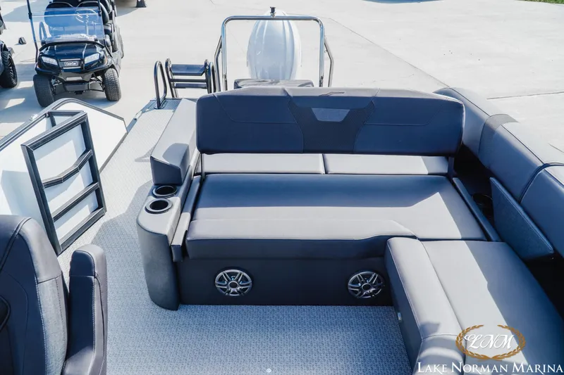 Slide: The Image of Luxurious 2026 Evotti 523CS boat interior with plush seating at Lake Norman Marina. - 18