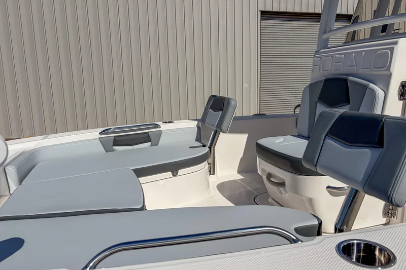 Slide: The Image of 2025 Robalo 226 Cayman boat interior with sleek seating and modern design. - 11