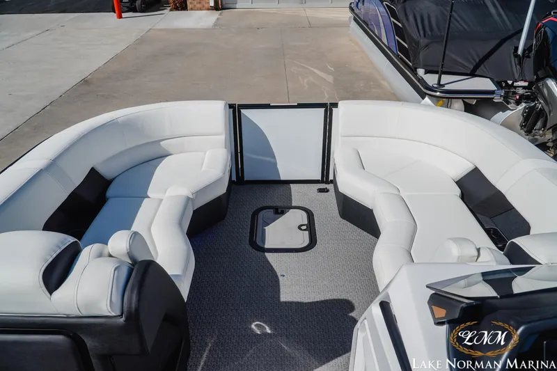 Slide: The Image of Luxurious seating on a 2026 Evotti 723CS boat at Lake Norman Marina. - 11