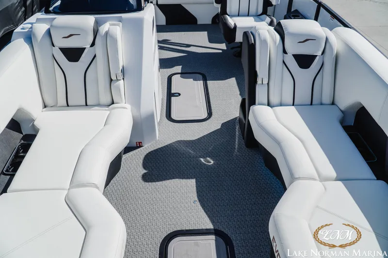 Slide: The Image of Luxurious interior of 2026 Evotti 723CS boat with white seating at Lake Norman Marina. - 14
