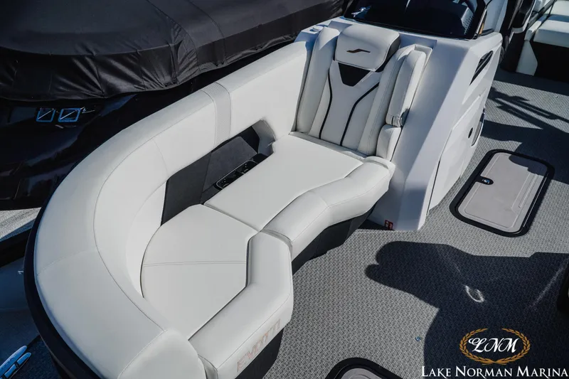 Slide: The Image of 2026 Evotti 723CS boat interior with luxurious white seating at Lake Norman Marina. - 15