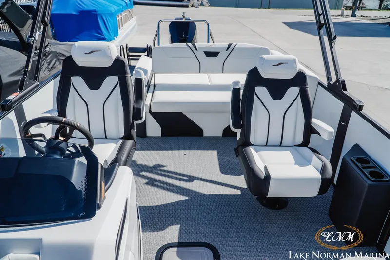 Slide: The Image of Interior of 2026 Evotti 723CS boat with modern seating at Lake Norman Marina. - 17