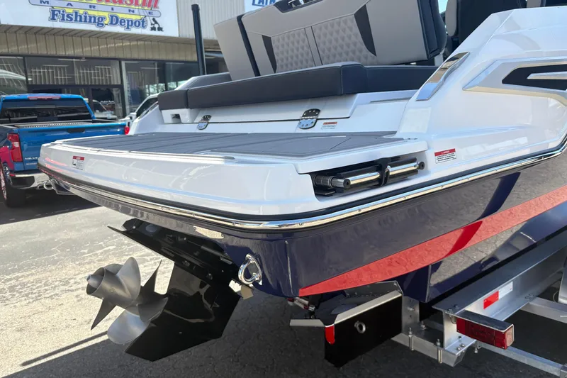 Slide: The Image of 2026 Monterey Elite 25 SD boat rear view with propeller and swim platform. - 10