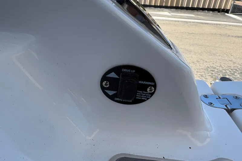 Slide: The Image of Control panel on a 2026 Monterey Elite 25 SD boat, featuring drive adjustment. - 14