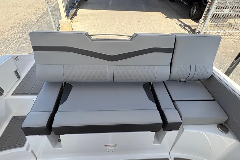 Slide: The Image of 2026 Monterey Elite 25 SD boat seating with modern gray upholstery and sleek design. - 18