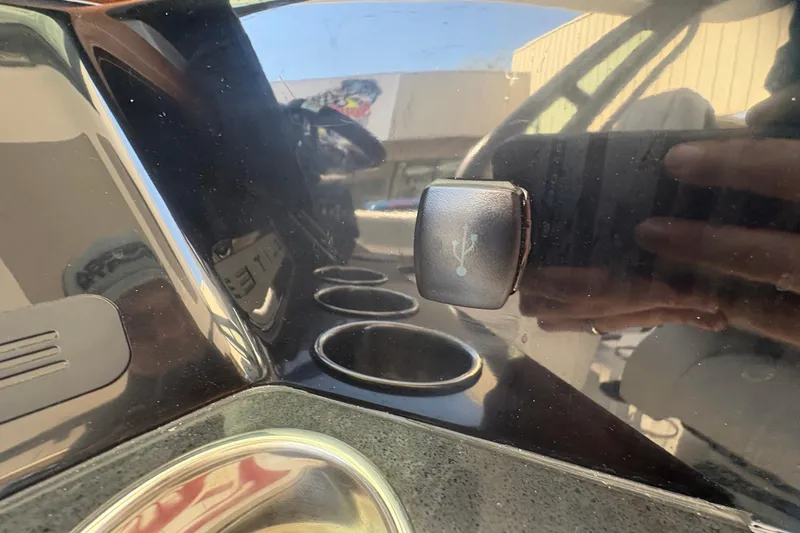 Slide: The Image of Dashboard of 2026 Monterey Elite 25 SD with USB port and cup holders. - 26