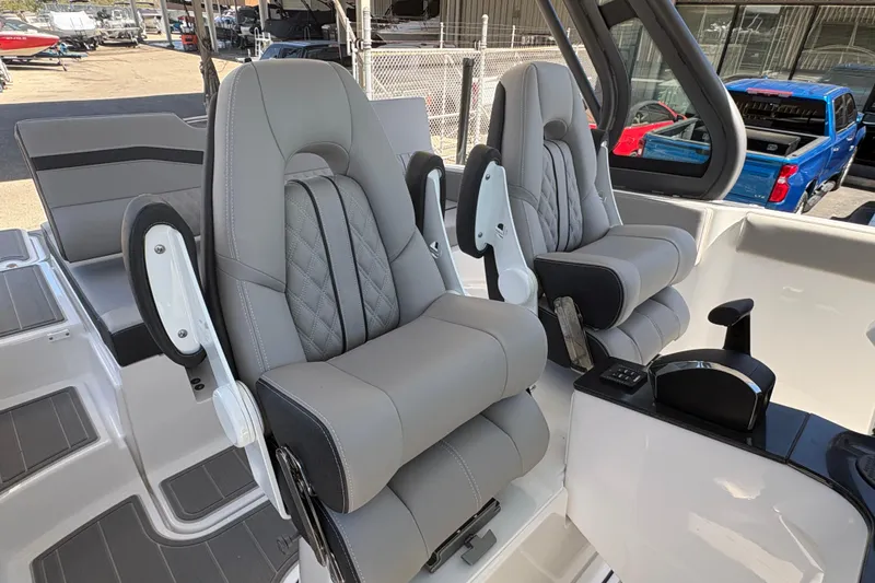 Slide: The Image of Luxurious seating in the 2026 Monterey Elite 25 SD boat, featuring modern design and comfort. - 33