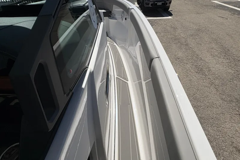 Slide: The Image of 2026 Monterey Elite 25 SD boat interior with sleek design and modern features. - 36