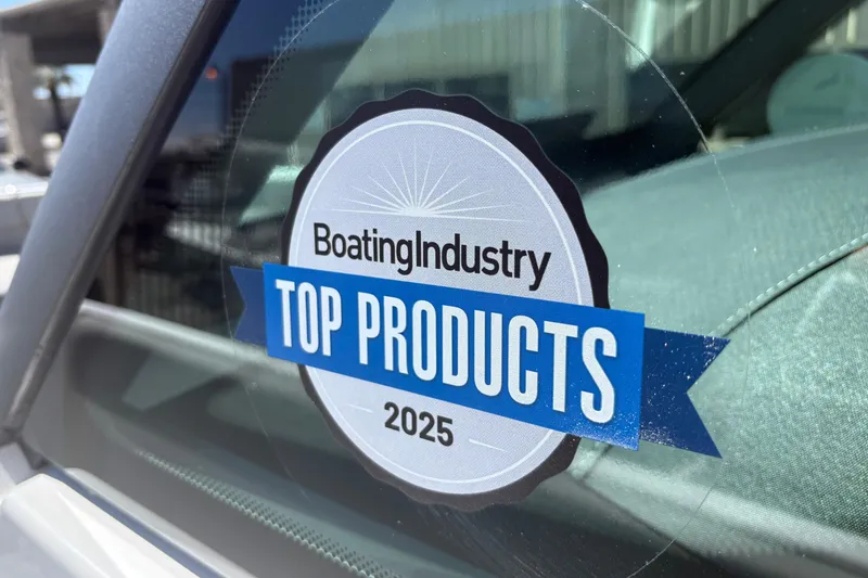 Slide: The Image of Boating Industry Top Products 2025 sticker on Monterey Elite 25 SD window. - 45