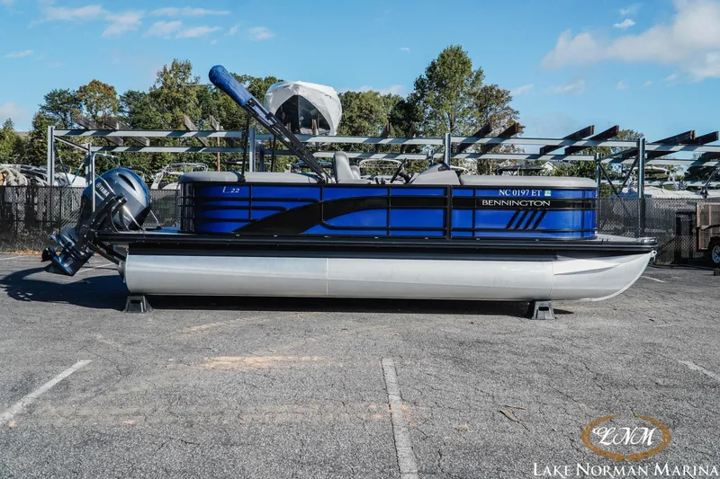 The Image of 2021 Bennington 22LSR pontoon boat in blue, parked at Lake Norman Marina. - 1