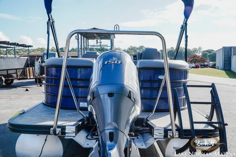 Slide: The Image of 2021 Bennington 22LSR pontoon boat with 150 HP engine at Lake Norman Marina. - 3