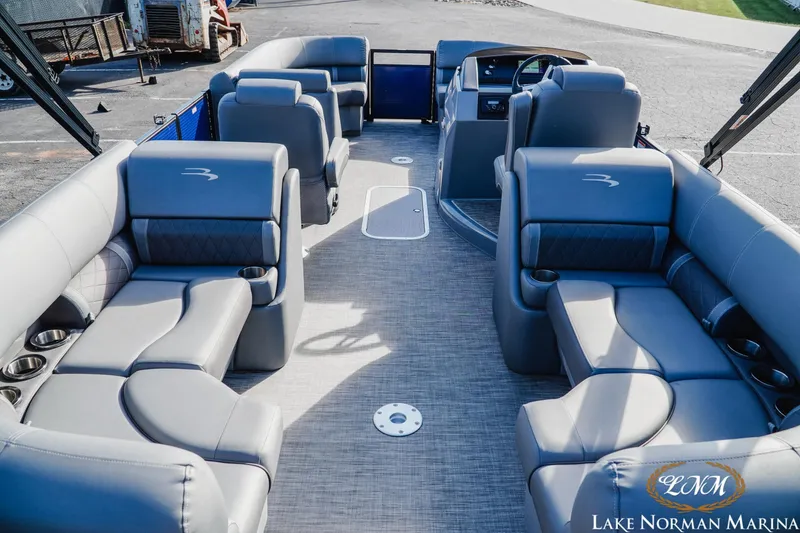 Slide: The Image of Luxurious interior of a 2021 Bennington 22LSR pontoon boat with plush seating. - 6