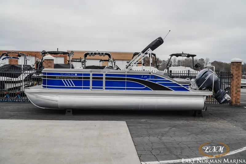 The Image of 2024 Bennington 23LSB pontoon boat with Yamaha outboard motor at Lake Norman Marina. - 1