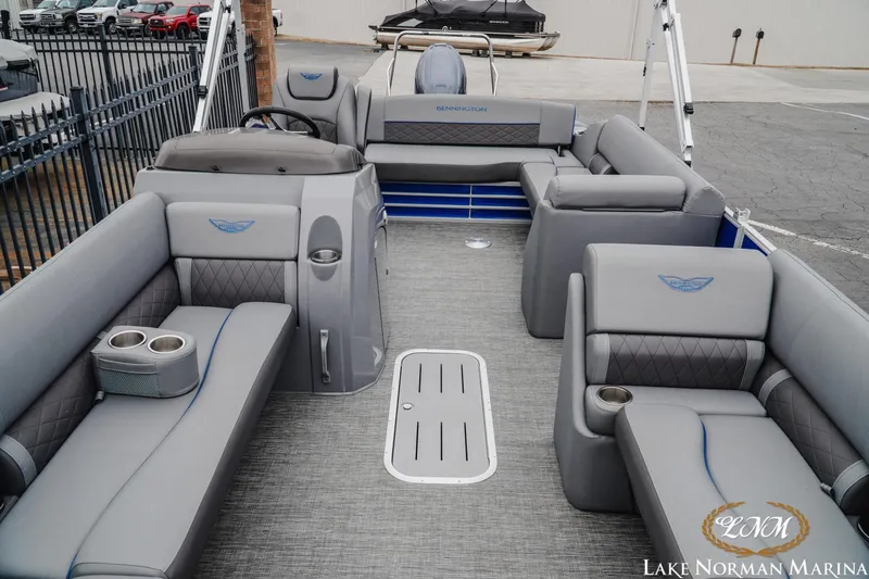 Slide: The Image of 2024 Bennington 23LSB pontoon boat interior with luxurious seating and modern design. - 10