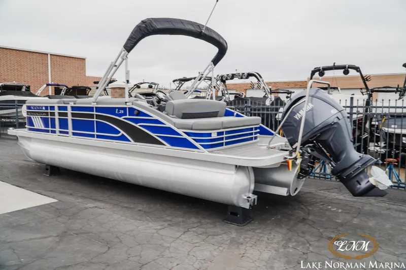 Slide: The Image of 2024 Bennington 23LSB pontoon boat with Yamaha outboard at Lake Norman Marina. - 3