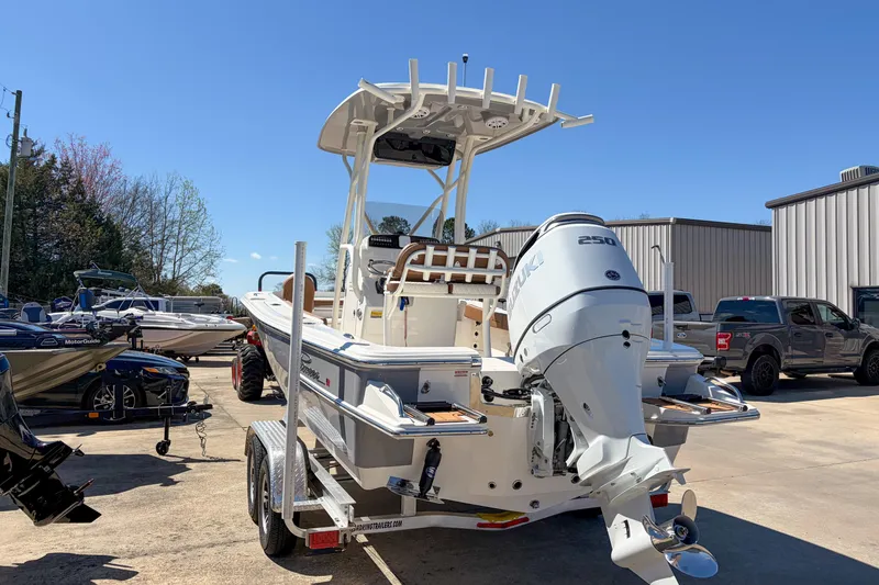 Slide: The Image of 2026 Pioneer 220 Bay Sport boat with Suzuki 250 engine on trailer. - 5