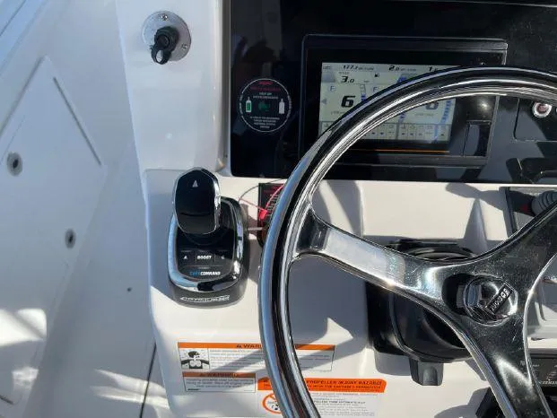 Slide: The Image of Control console of a 2020 Edgewater 370CC boat. - 11