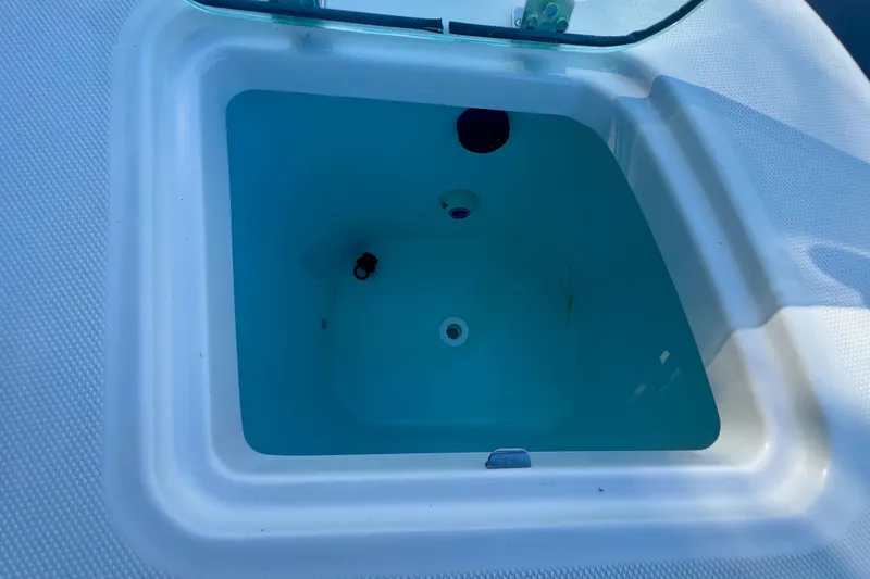 Slide: The Image of Livewell on 2020 Edgewater 370CC boat, filled with water. - 29