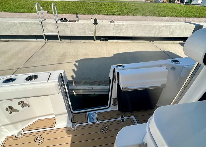 Slide: The Image of 2020 Edgewater 370CC boat deck with open door. - 5