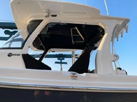 Slide: The Image of 2020 Edgewater 370CC boat with sleek design and features. - 7