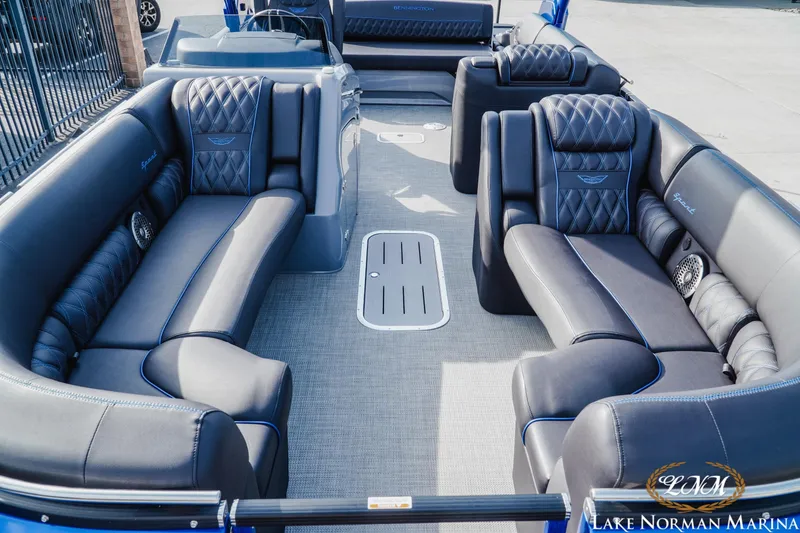 Slide: The Image of Luxurious interior of 2025 Bennington 25QXSBA pontoon boat with plush seating. - 15
