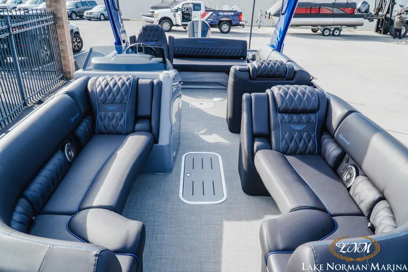 Slide: The Image of Luxurious interior of 2025 Bennington 25QXSBA pontoon boat at Lake Norman Marina. - 16