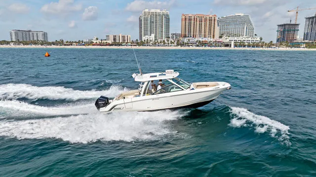 Slide: The Image of 2020 Boston Whaler 320 Vantage boat interior with luxurious seating and modern design. - 59